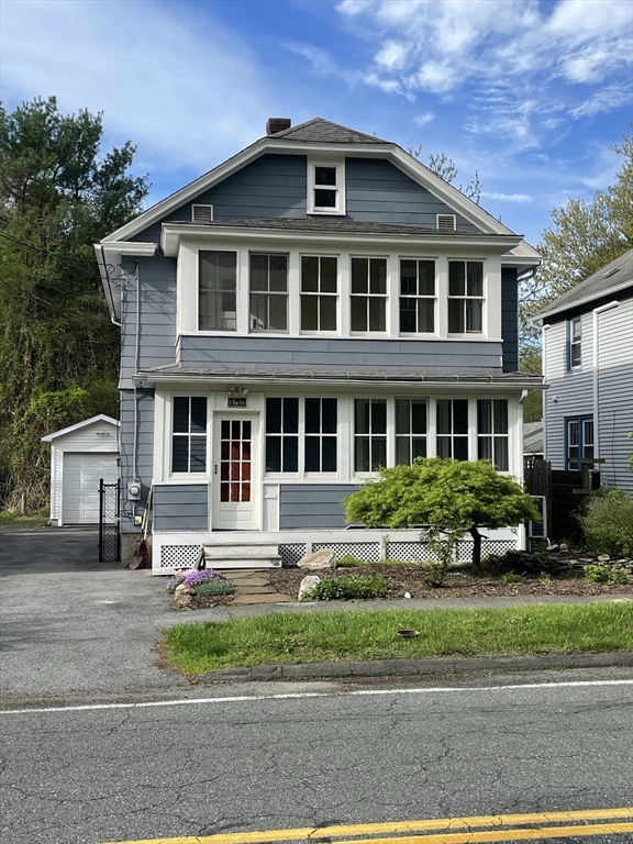 492 Elm Street Northampton, MA 01060 - Photo 2 of 31 a front view of a house with a yard