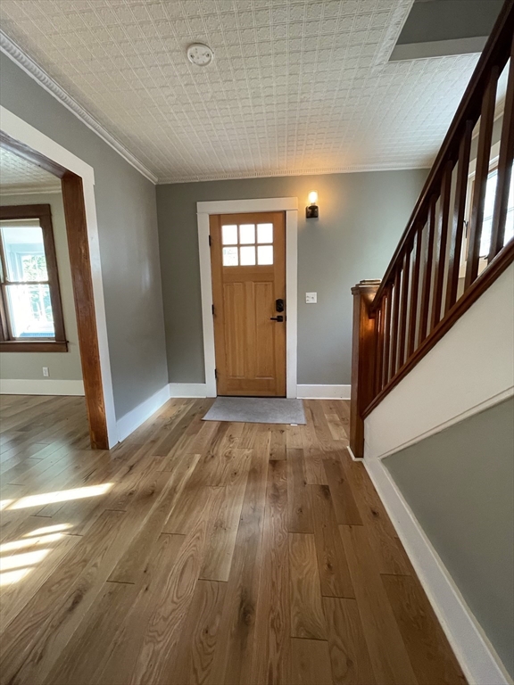 492 Elm Street Northampton, MA 01060 - Photo 24 of 31 a view of empty room with wooden floor and fan