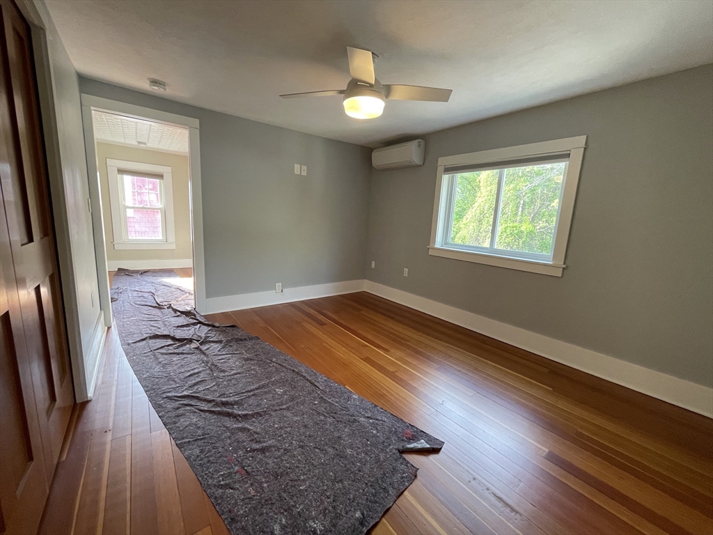 492 Elm Street Northampton, MA 01060 - Photo 25 of 31 wooden floor in an empty room with a window