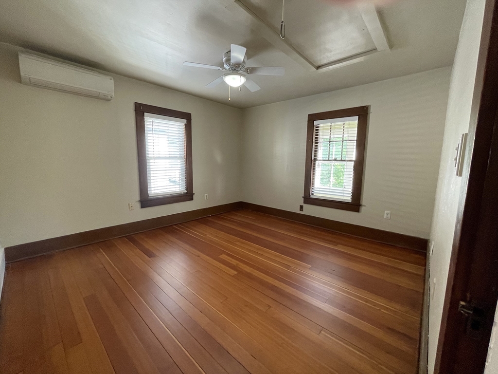 492 Elm Street Northampton, MA 01060 - Photo 27 of 31 a view of empty room with wooden floor and fan