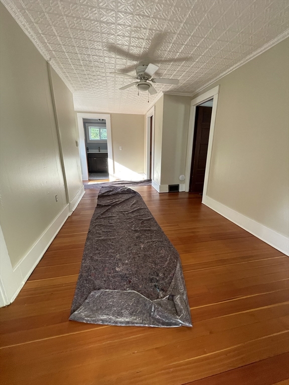 492 Elm Street Northampton, MA 01060 - Photo 28 of 31 a view of a livingroom with wooden floor and a ceiling fan