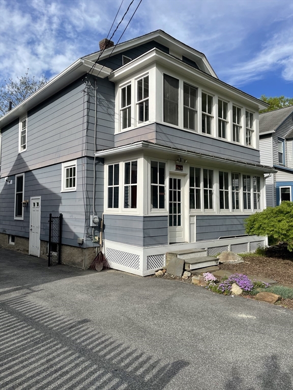 492 Elm Street Northampton, MA 01060 - Photo 3 of 31 a front view of a house with a yard