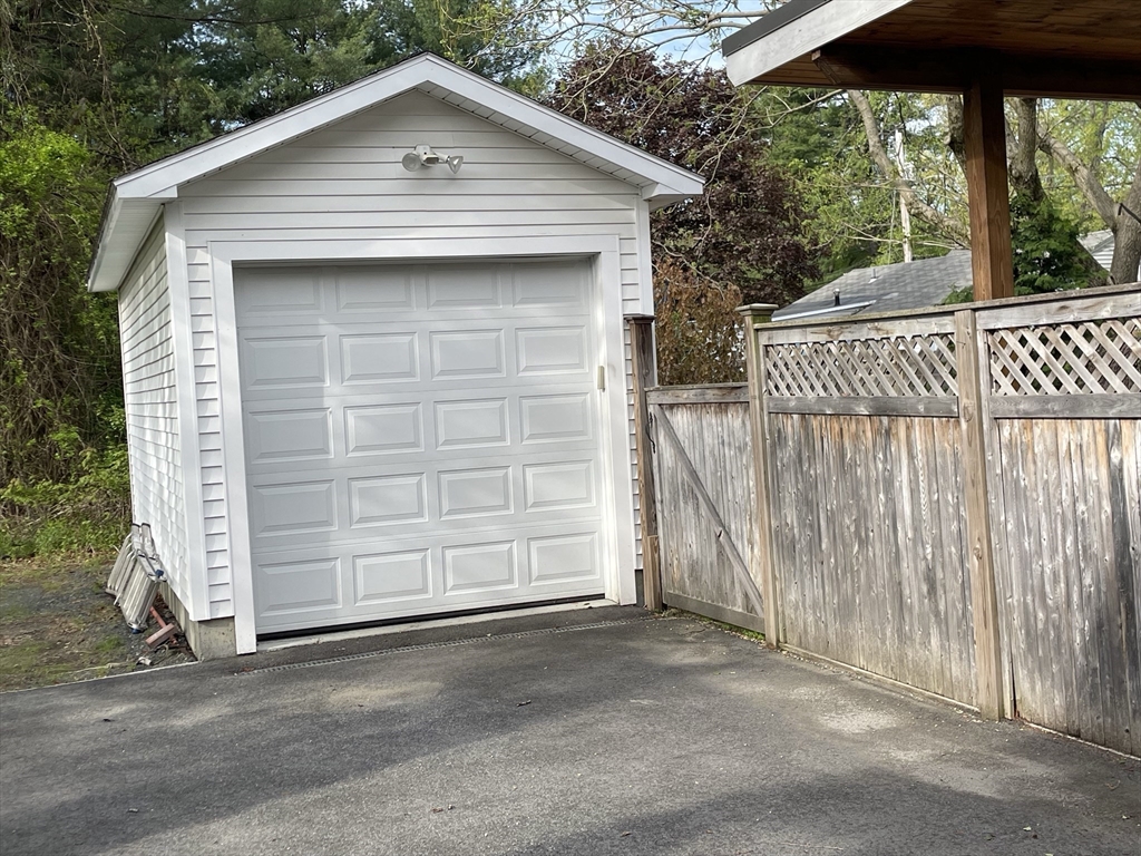 492 Elm Street Northampton, MA 01060 - Photo 8 of 31 a front view of a house with a garage