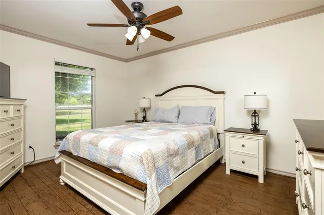 a view of a refrigerator and microwave in a kitchen