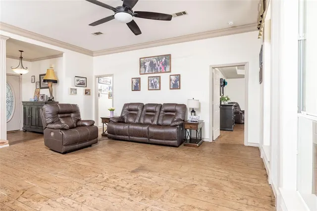 a living room with furniture and a window