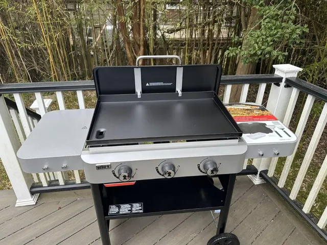 a view of a balcony with chairs