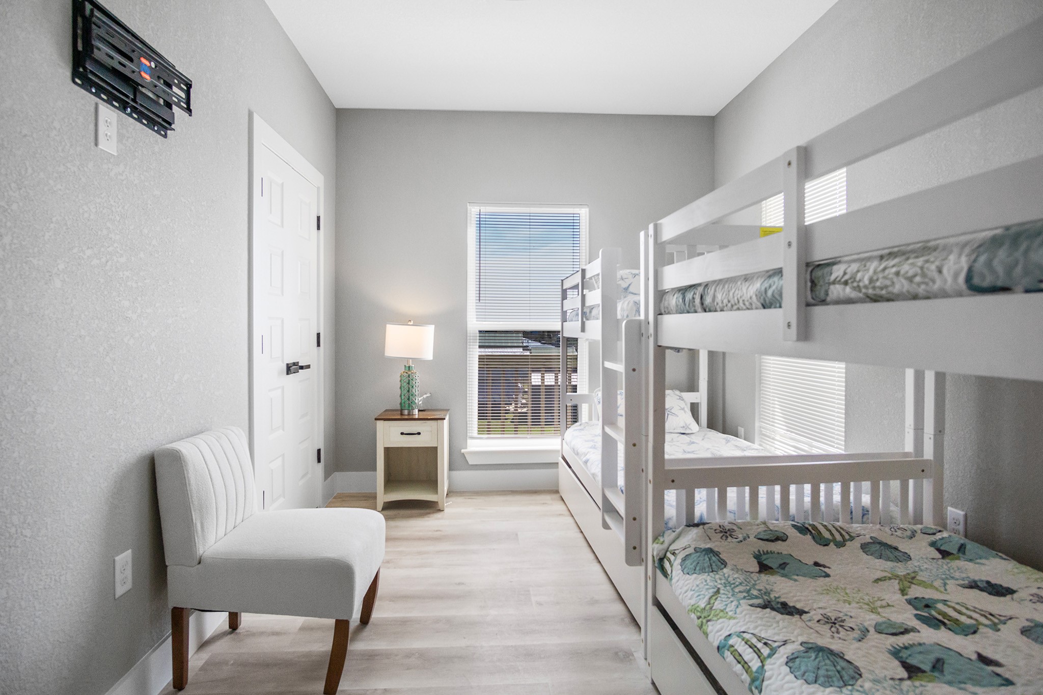 1297 Mabry Port Bolivar, TX 77650 - Photo 16 of 38 a bedroom with furniture and wooden floor