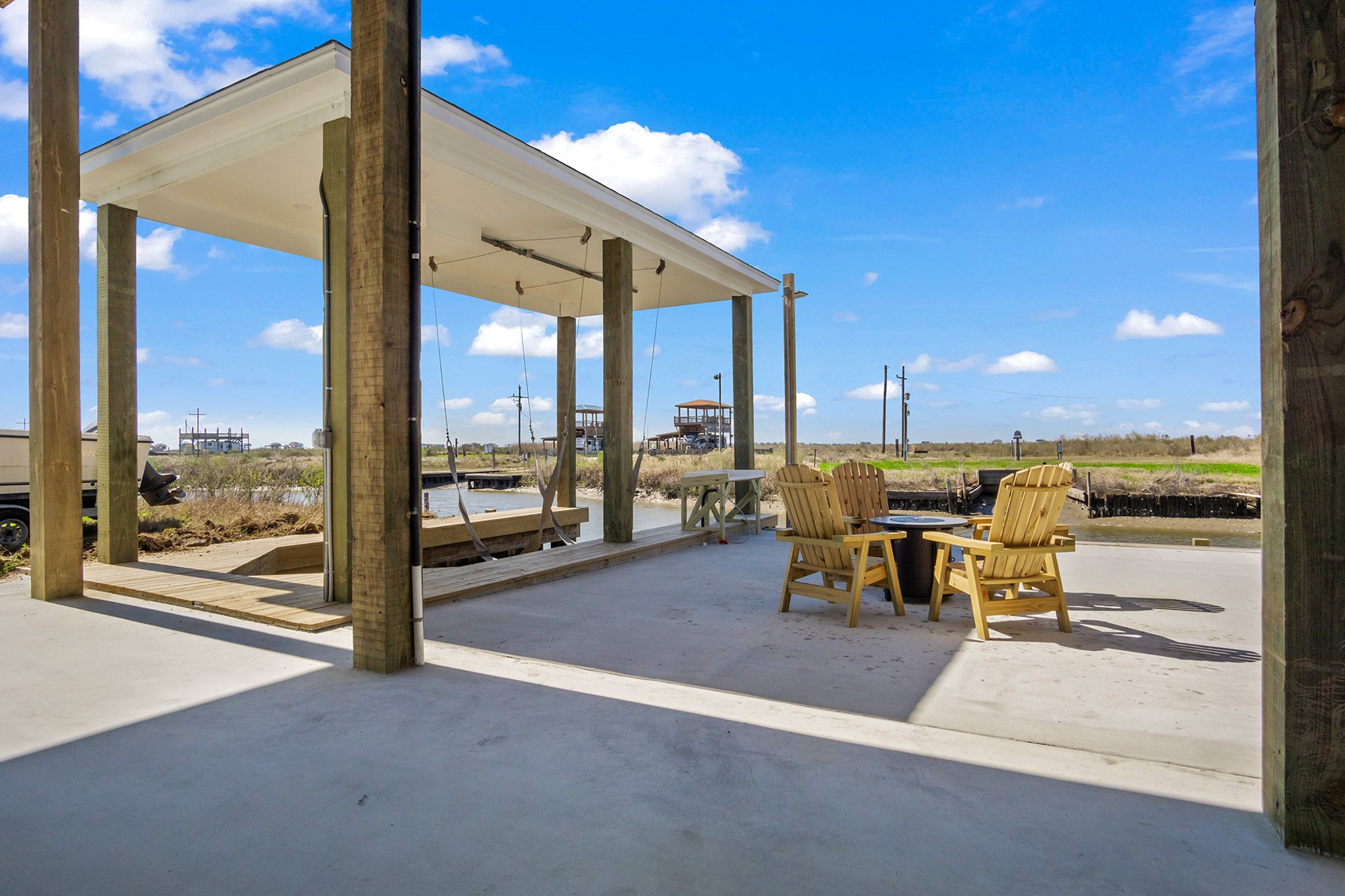 1297 Mabry Port Bolivar, TX 77650 - Photo 35 of 38 a view of a terrace with seating area