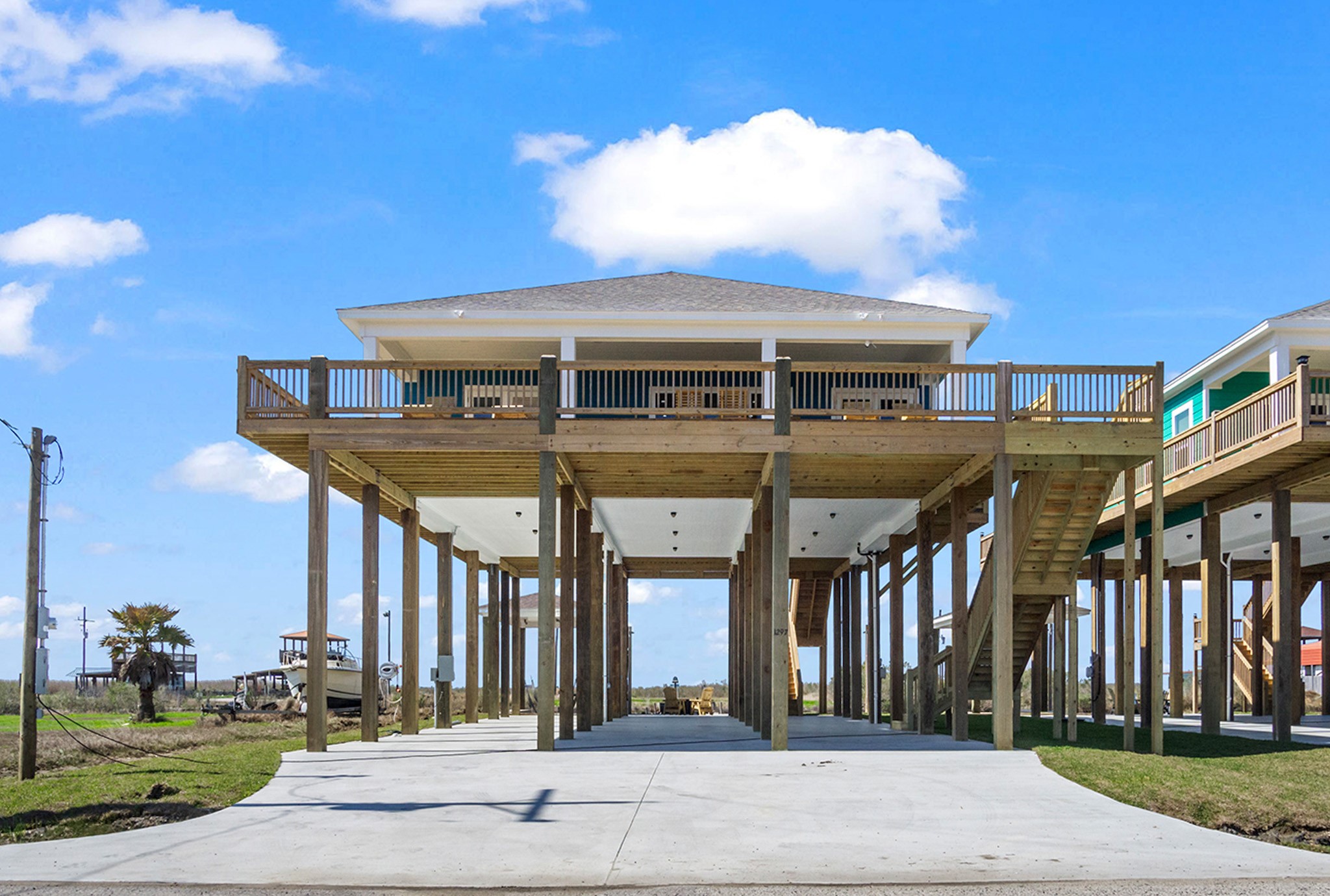 1297 Mabry Port Bolivar, TX 77650 - Photo 36 of 38 front view of a building with a street