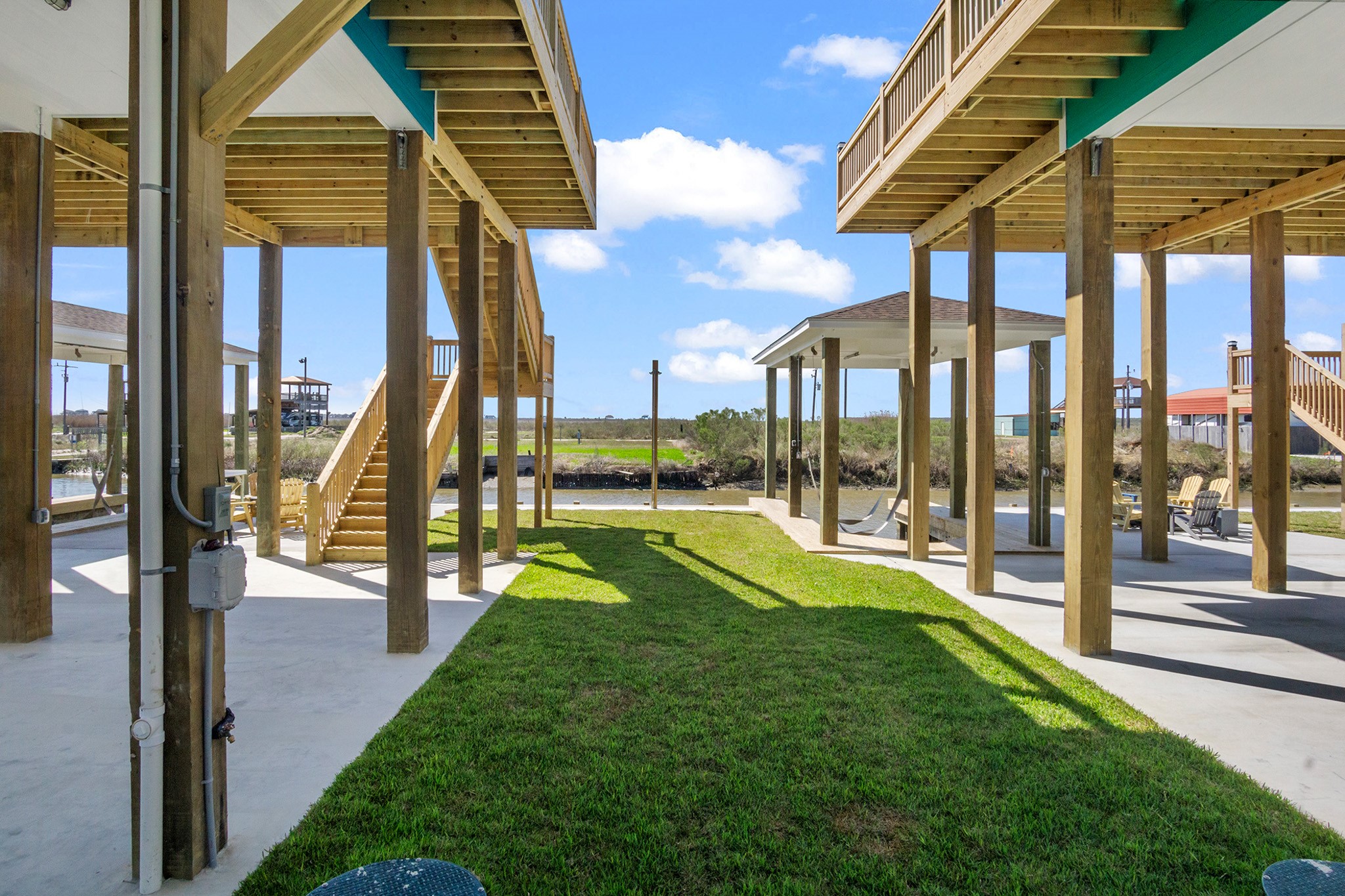 1297 Mabry Port Bolivar, TX 77650 - Photo 38 of 38 a view of a house with backyard and porch