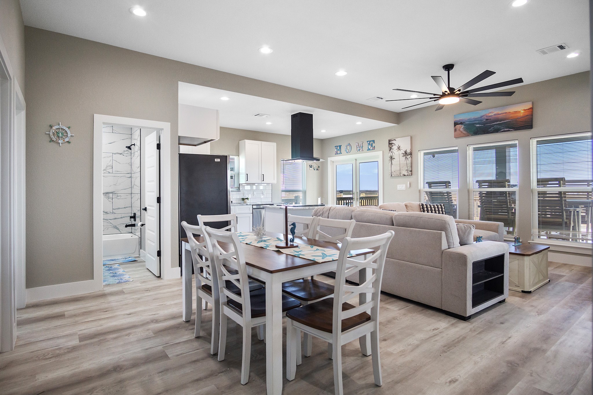 1297 Mabry Port Bolivar, TX 77650 - Photo 7 of 38 a view of a dining room with furniture window and wooden floor