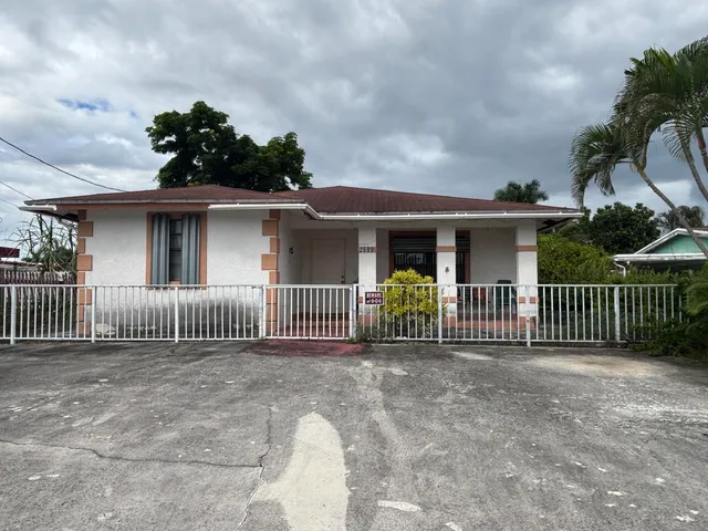 a front view of a house with a porch