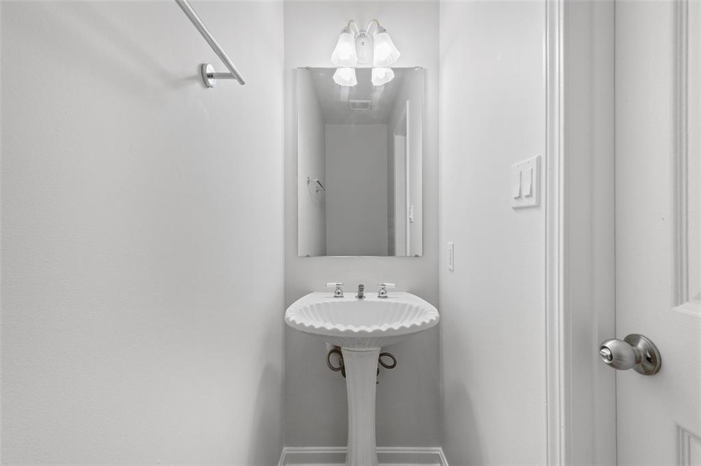 482 Shelbourne Drive Pittsburgh, PA 15239 - Photo 19 of 49 a bathroom with a sink and a mirror