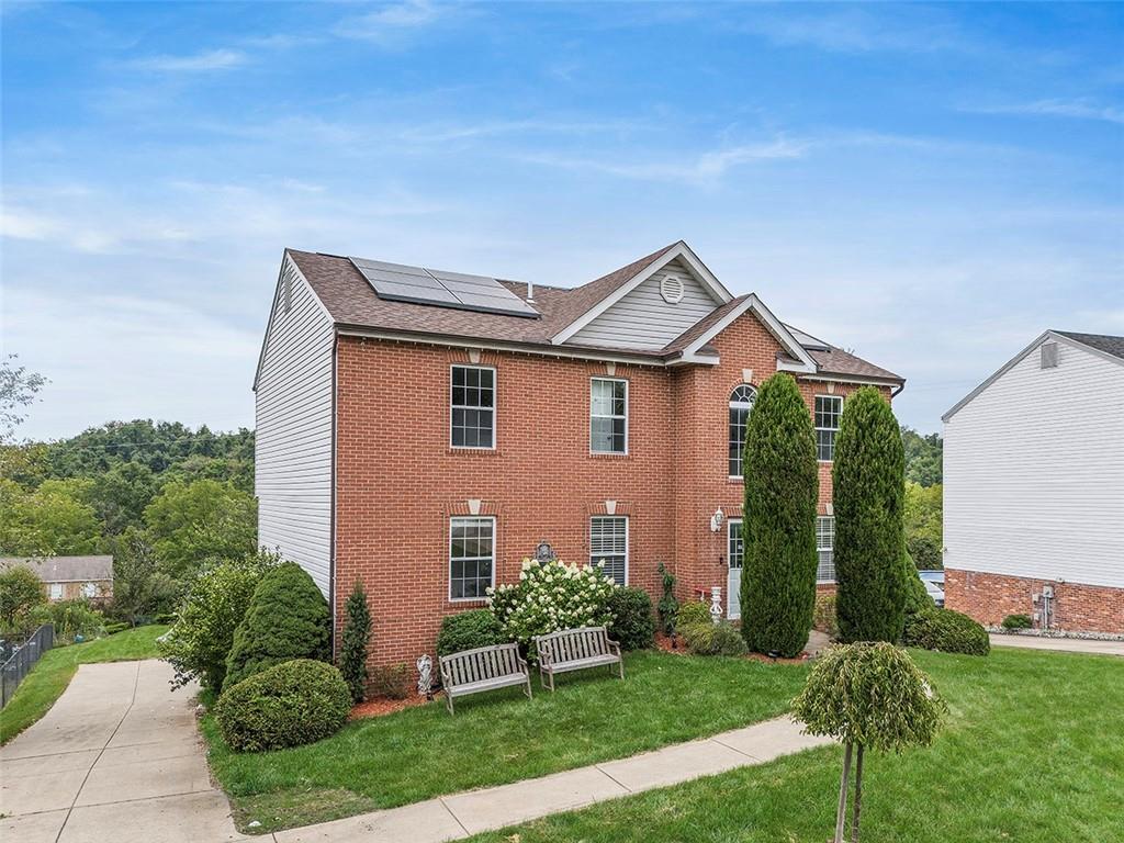 482 Shelbourne Drive Pittsburgh, PA 15239 - Photo 2 of 49 a front view of a house with a yard