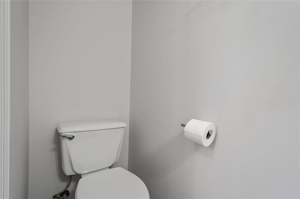 482 Shelbourne Drive Pittsburgh, PA 15239 - Photo 32 of 49 a white toilet sitting next to a white wall