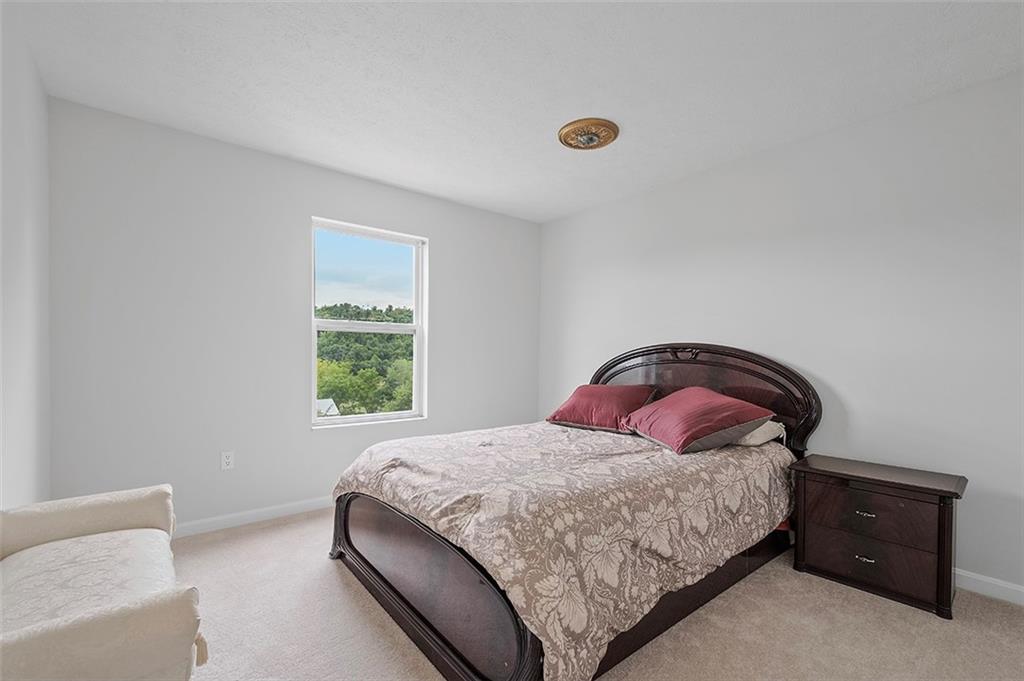 482 Shelbourne Drive Pittsburgh, PA 15239 - Photo 34 of 49 a bedroom with a bed and a window