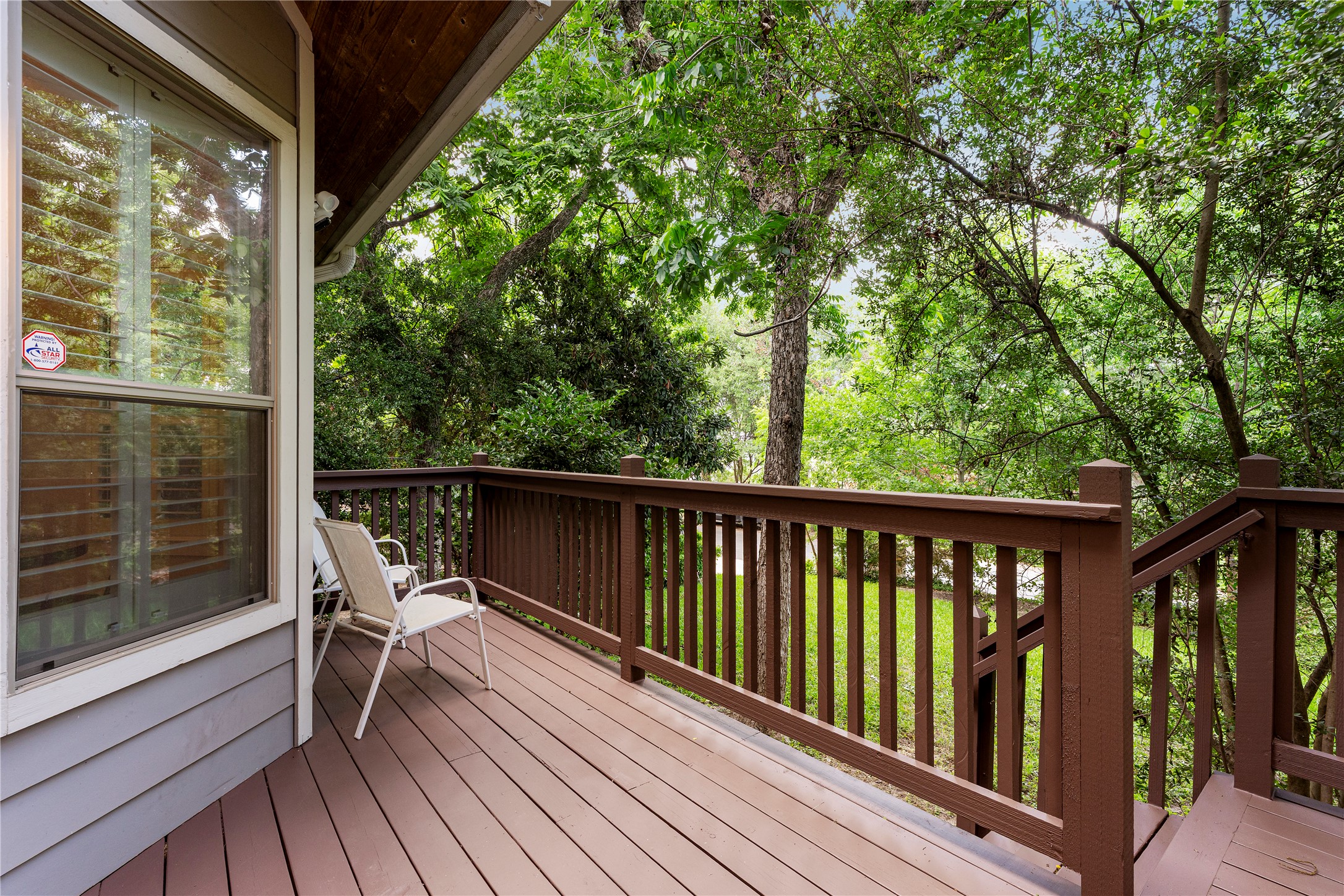 3814 Ridgelea Drive, Unit A Austin, TX 78731 - Photo 29 of 30 a view of balcony with furniture and wooden deck