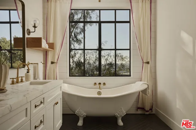 a bathroom with a shower and toilet