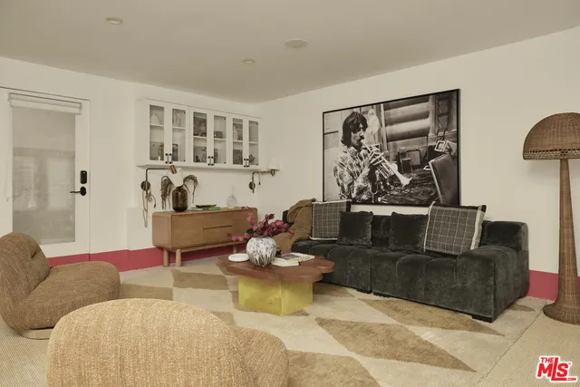 a utility room with sink dryer and washer