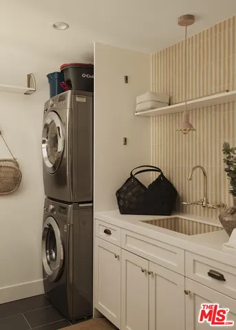a living room with furniture and windows