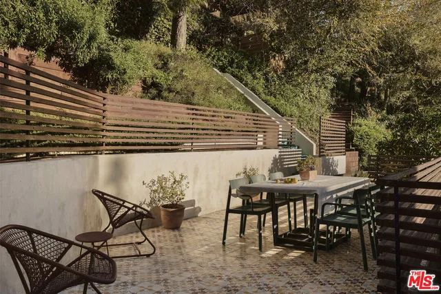 a view of a patio with furniture