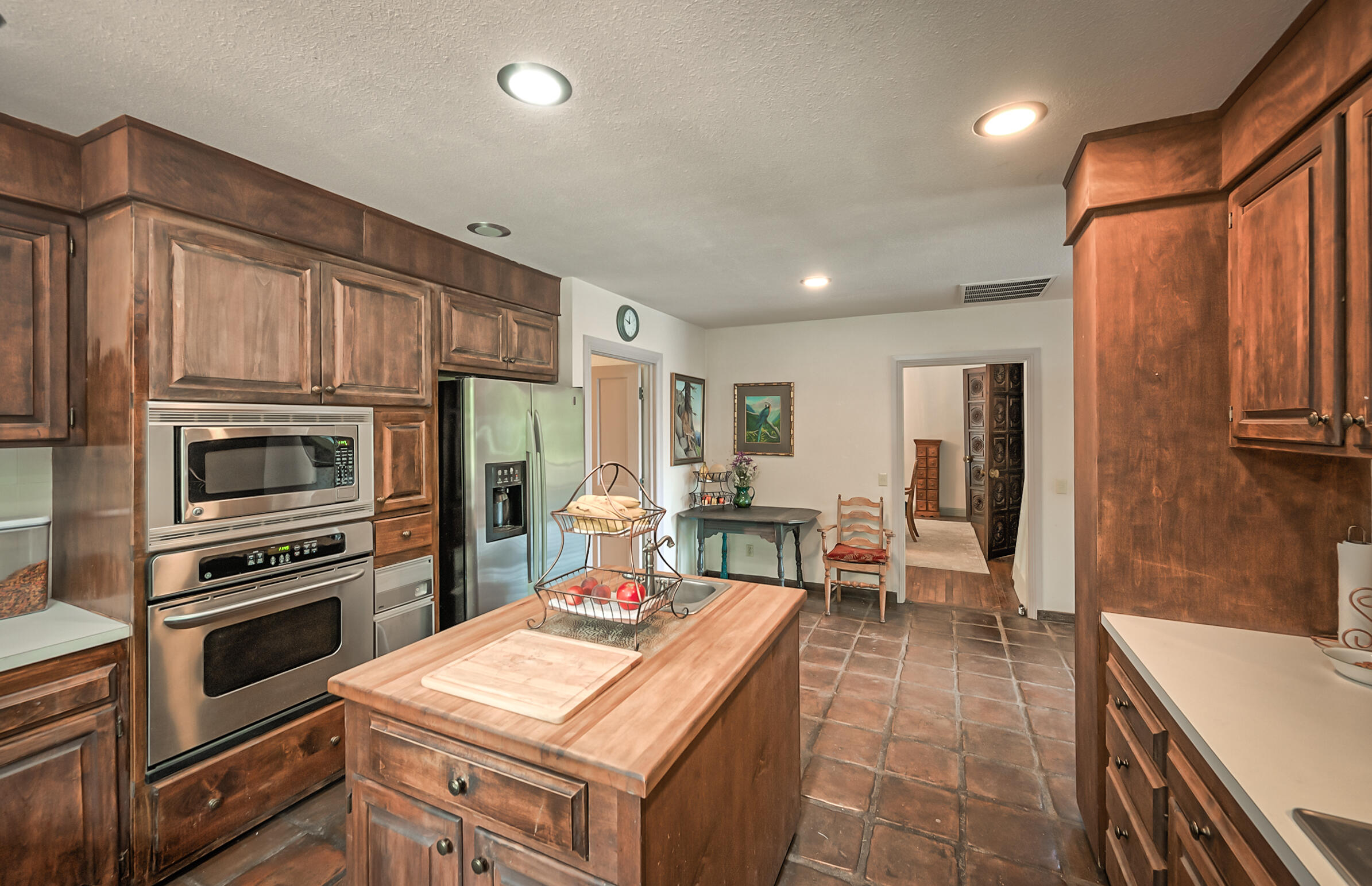 29230 Fenders Ferry Road Bella Vista, CA 96008 - Photo 20 of 60 a kitchen with a stove a sink and a refrigerator
