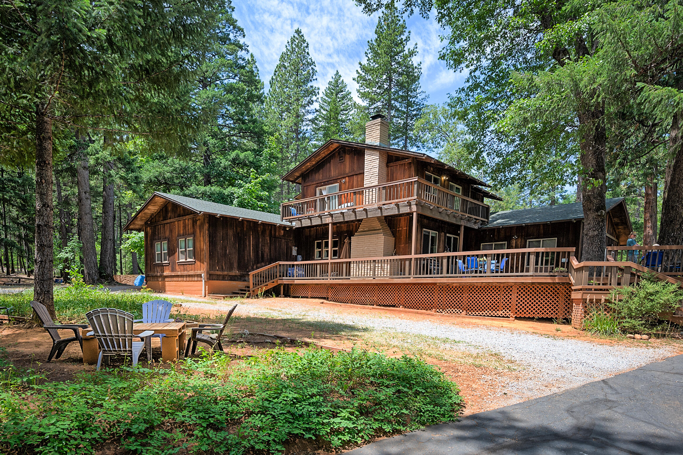 29230 Fenders Ferry Road Bella Vista, CA 96008 - Photo 2 of 60 a view of a house with pool and sitting area