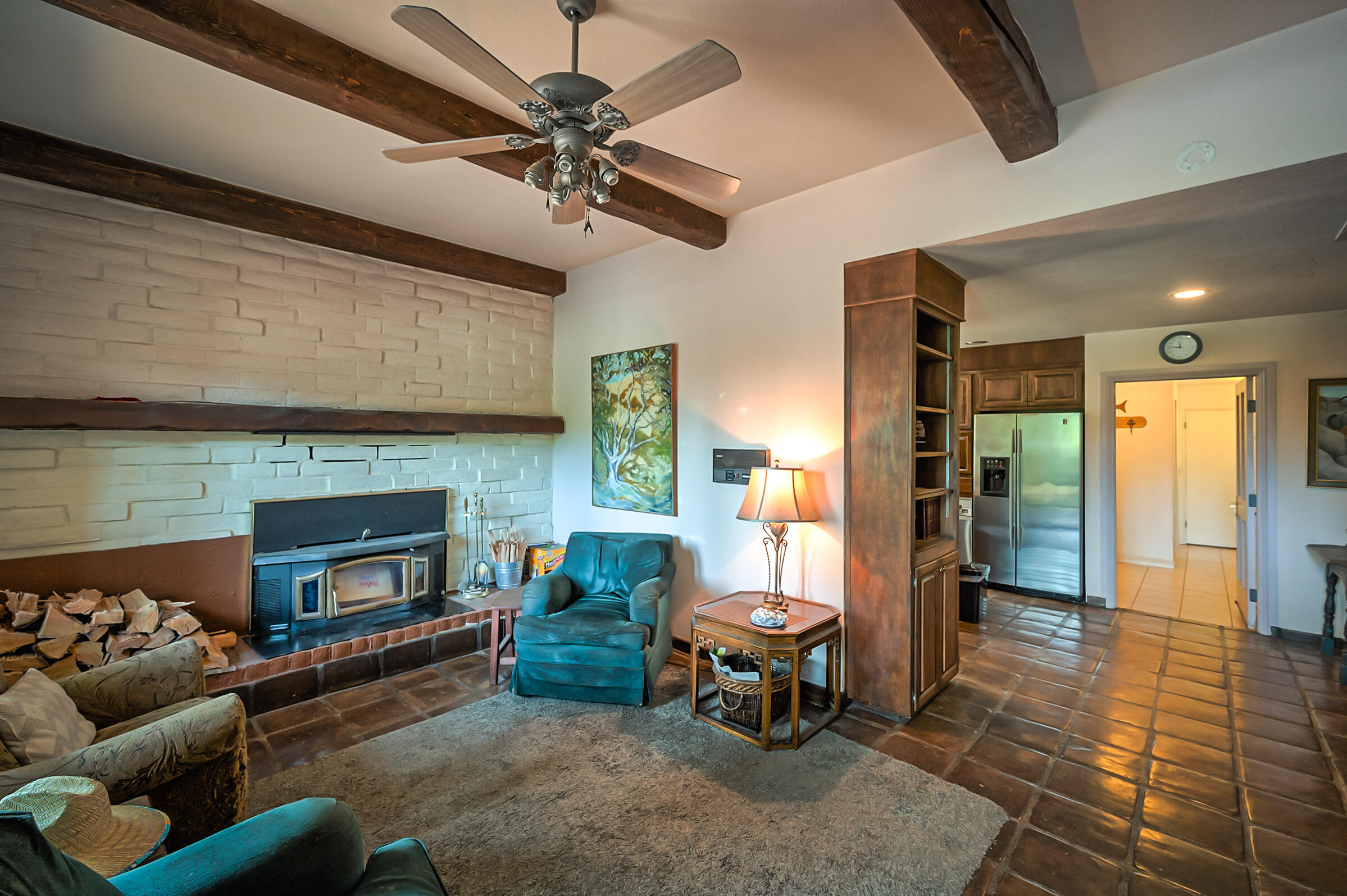 29230 Fenders Ferry Road Bella Vista, CA 96008 - Photo 21 of 60 a living room with furniture and a fireplace