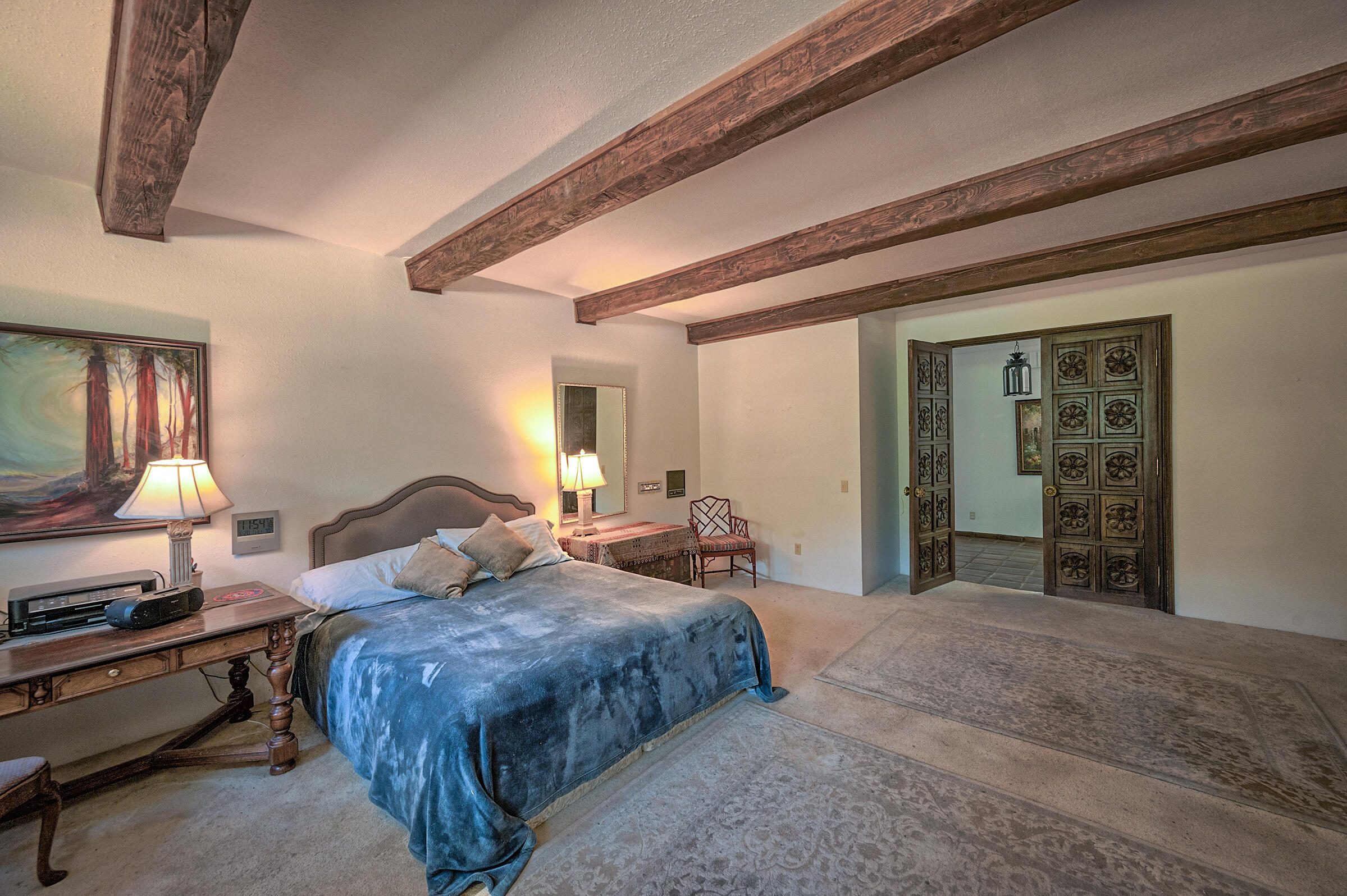 29230 Fenders Ferry Road Bella Vista, CA 96008 - Photo 24 of 60 a bedroom with a bed and a lamp on dresser