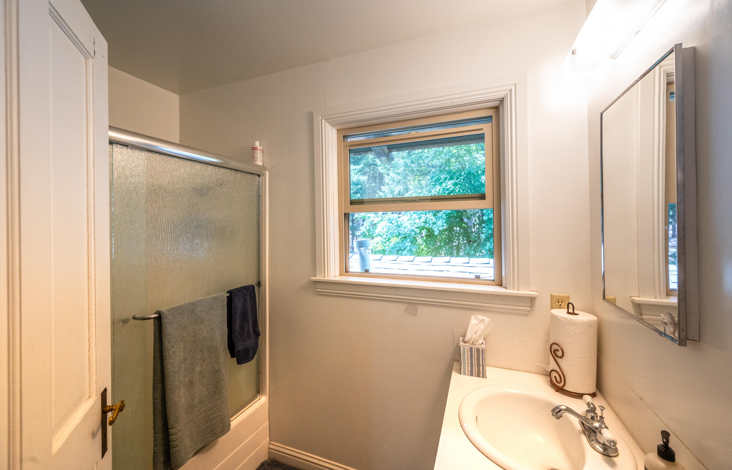 29230 Fenders Ferry Road Bella Vista, CA 96008 - Photo 35 of 60 a bathroom with a sink toilet and shower