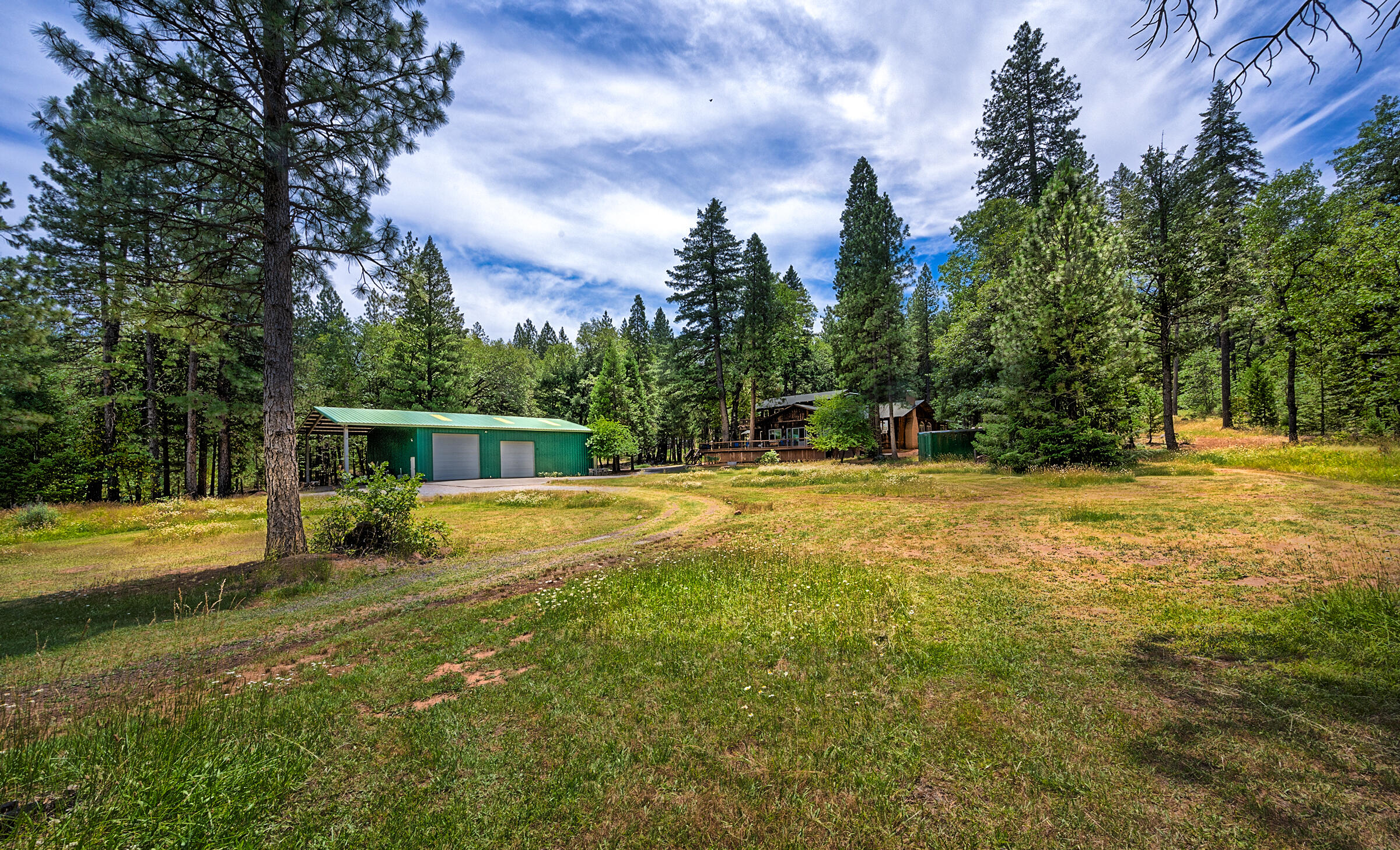 29230 Fenders Ferry Road Bella Vista, CA 96008 - Photo 49 of 60 a view of a house with swimming pool and yard