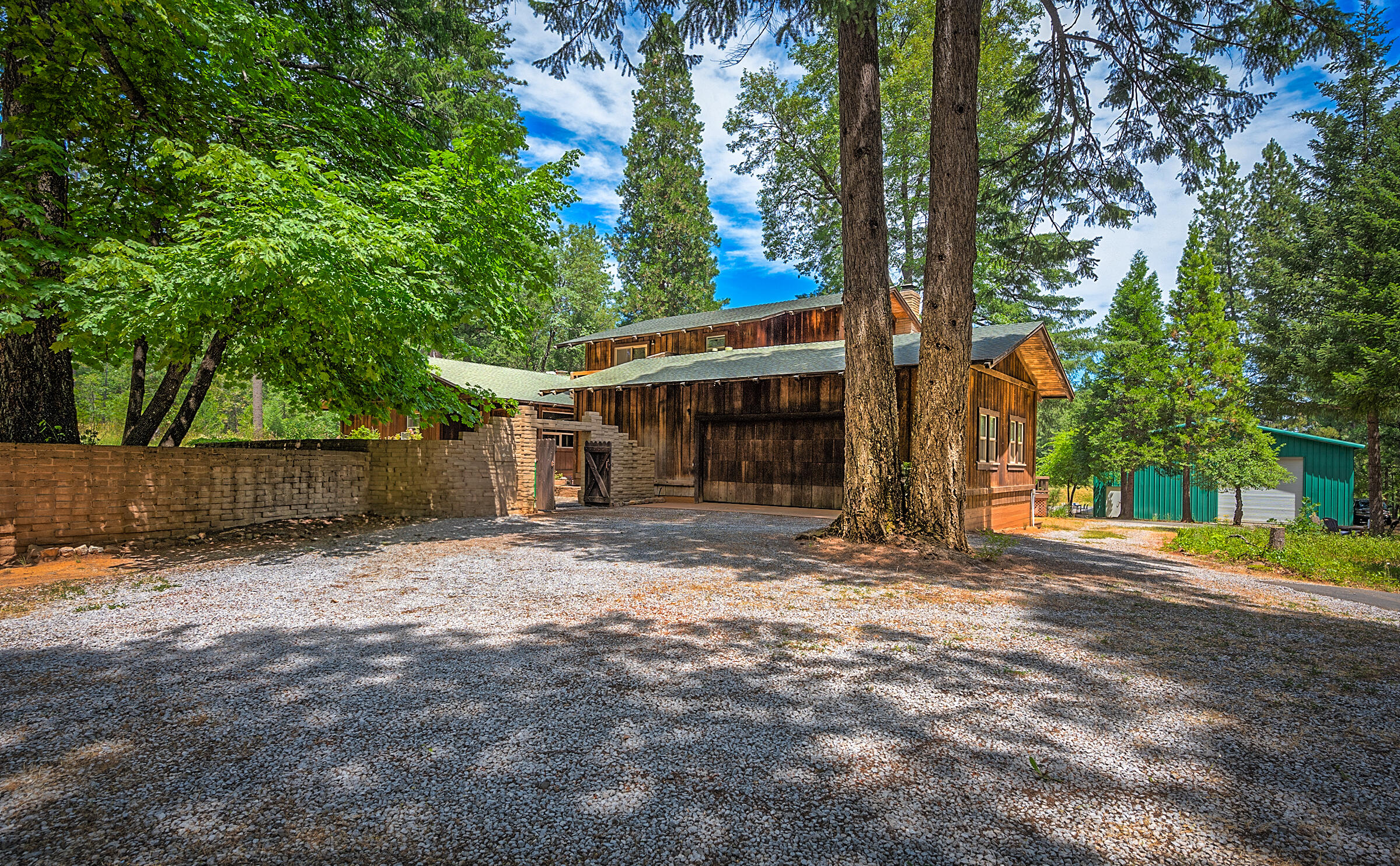 29230 Fenders Ferry Road Bella Vista, CA 96008 - Photo 5 of 60 a view of a house with a yard and tree