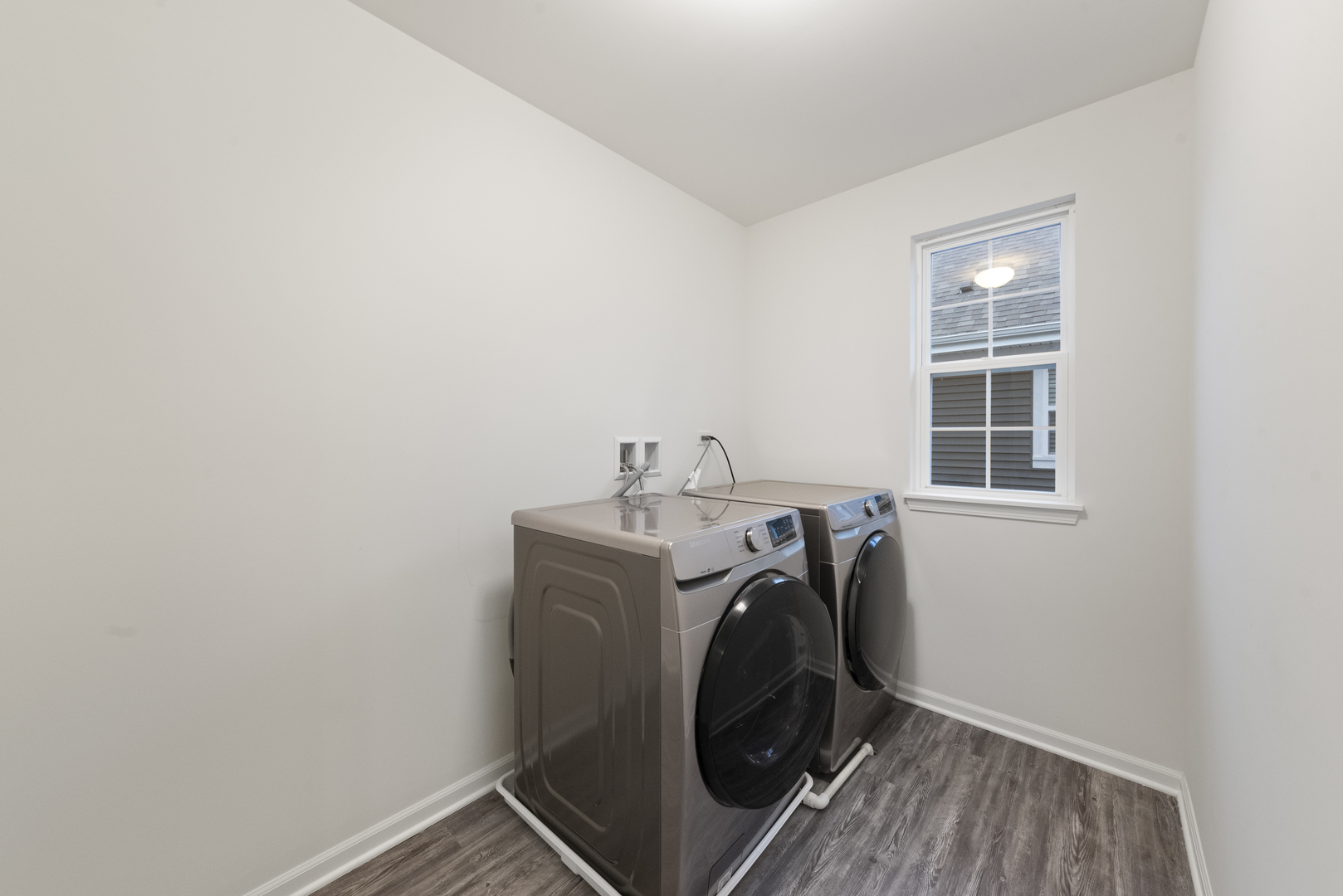 4431 Monroe Court Naperville, IL 60564 - Photo 11 of 13 a utility room with dryer and washer
