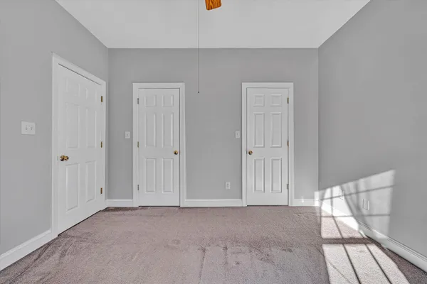 a front view of a building with an outdoor space