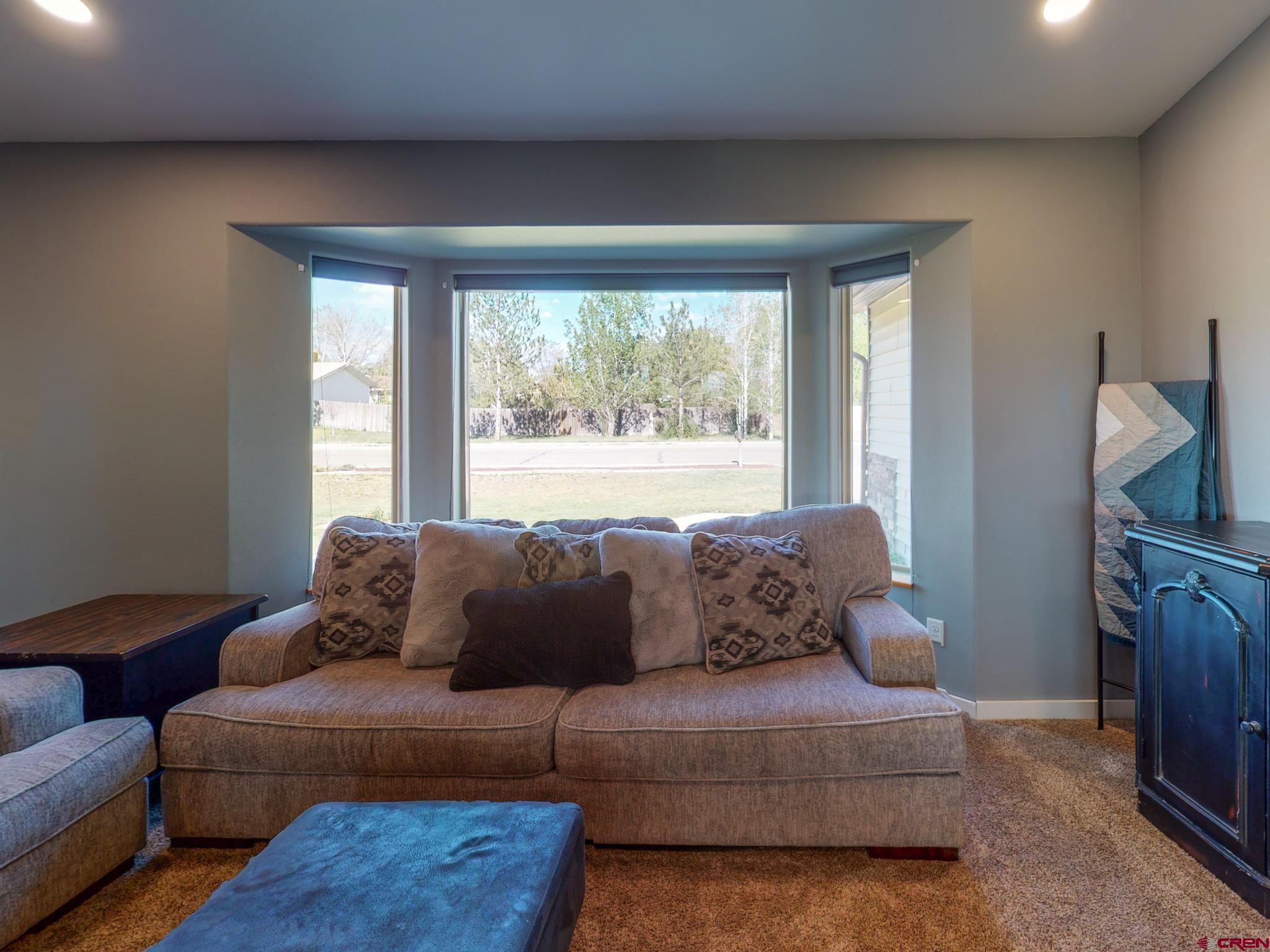 1819 Rolling Road Cortez, CO 81321 - Photo 8 of 35 a living room with furniture and a window