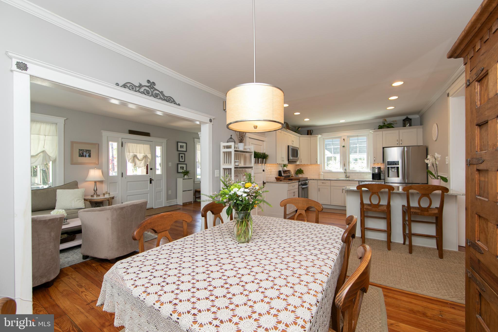 403 Belmont Avenue Haddonfield, NJ 08033 - Photo 13 of 47 a living room with furniture a table and chairs