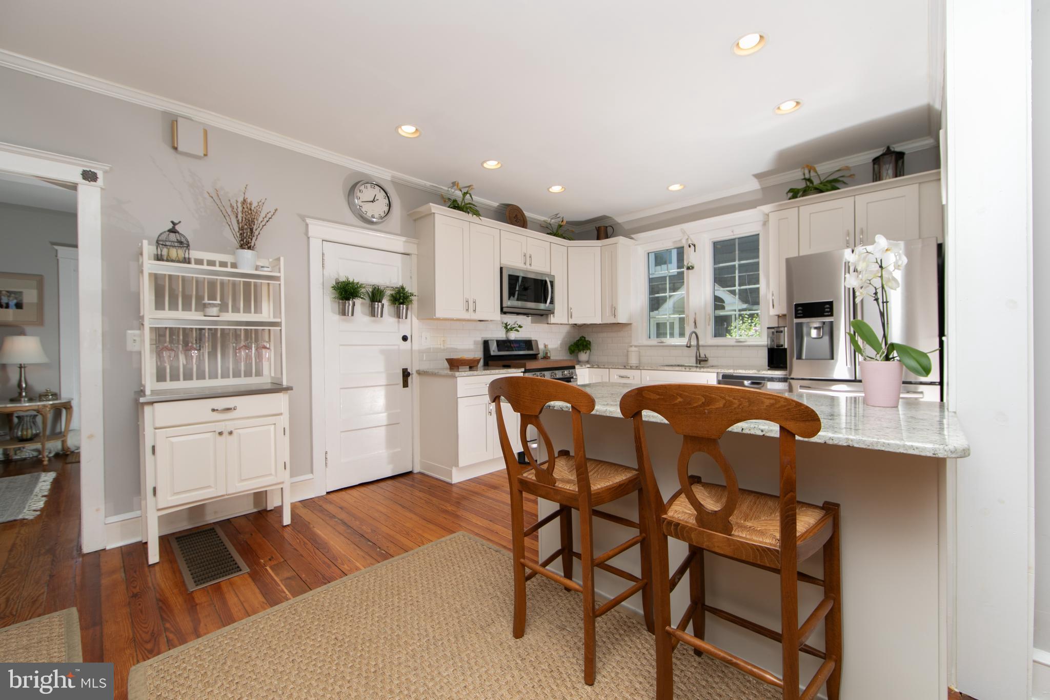 403 Belmont Avenue Haddonfield, NJ 08033 - Photo 16 of 47 a living room with stainless steel appliances kitchen island granite countertop furniture and a view of kitchen