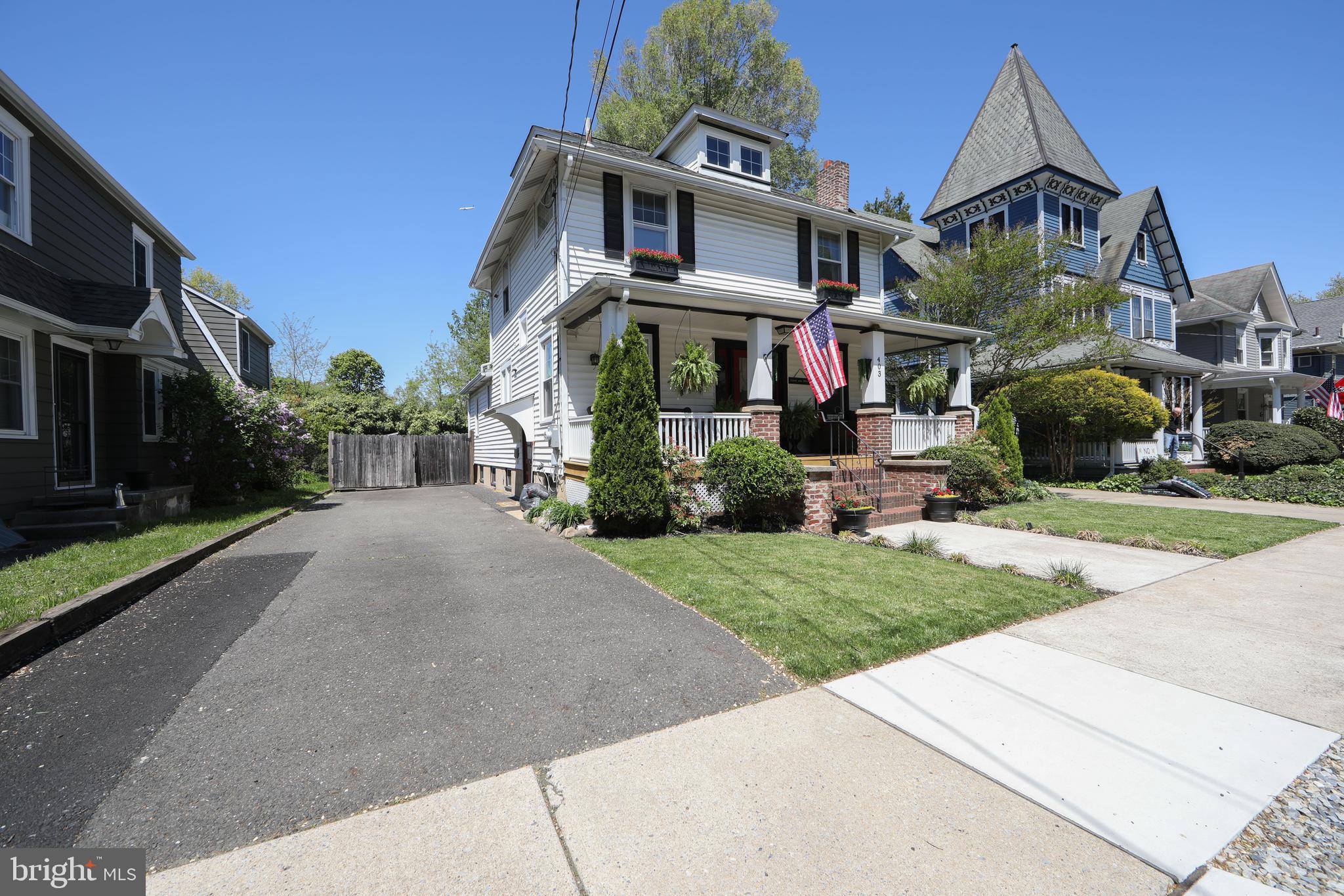 403 Belmont Avenue Haddonfield, NJ 08033 - Photo 2 of 47 a view of a building with a yard