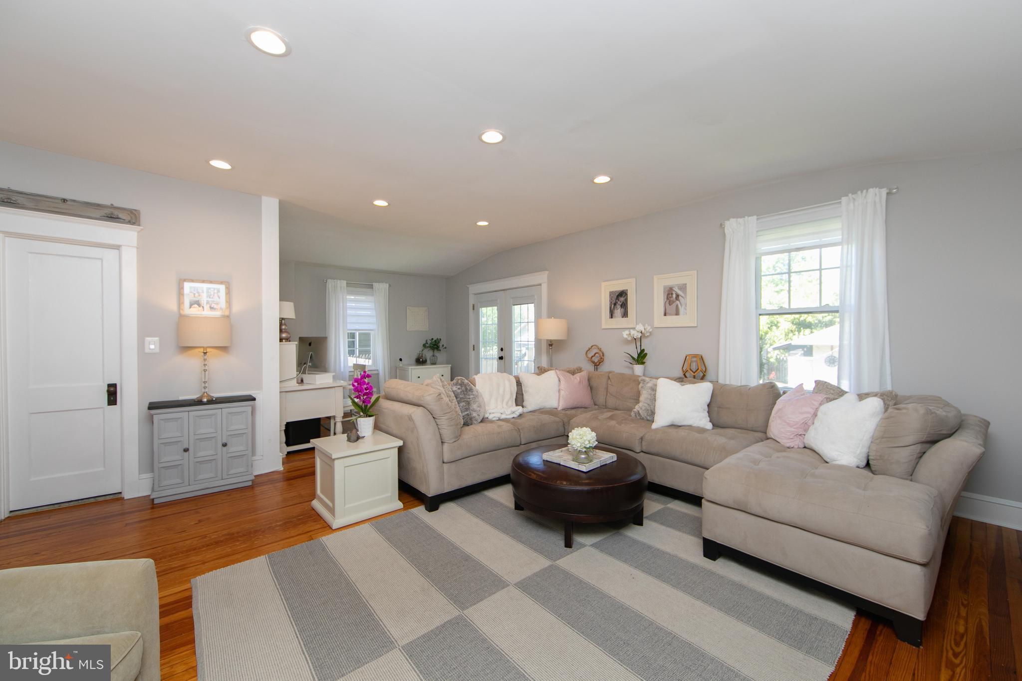 403 Belmont Avenue Haddonfield, NJ 08033 - Photo 21 of 47 a living room with furniture and a large window