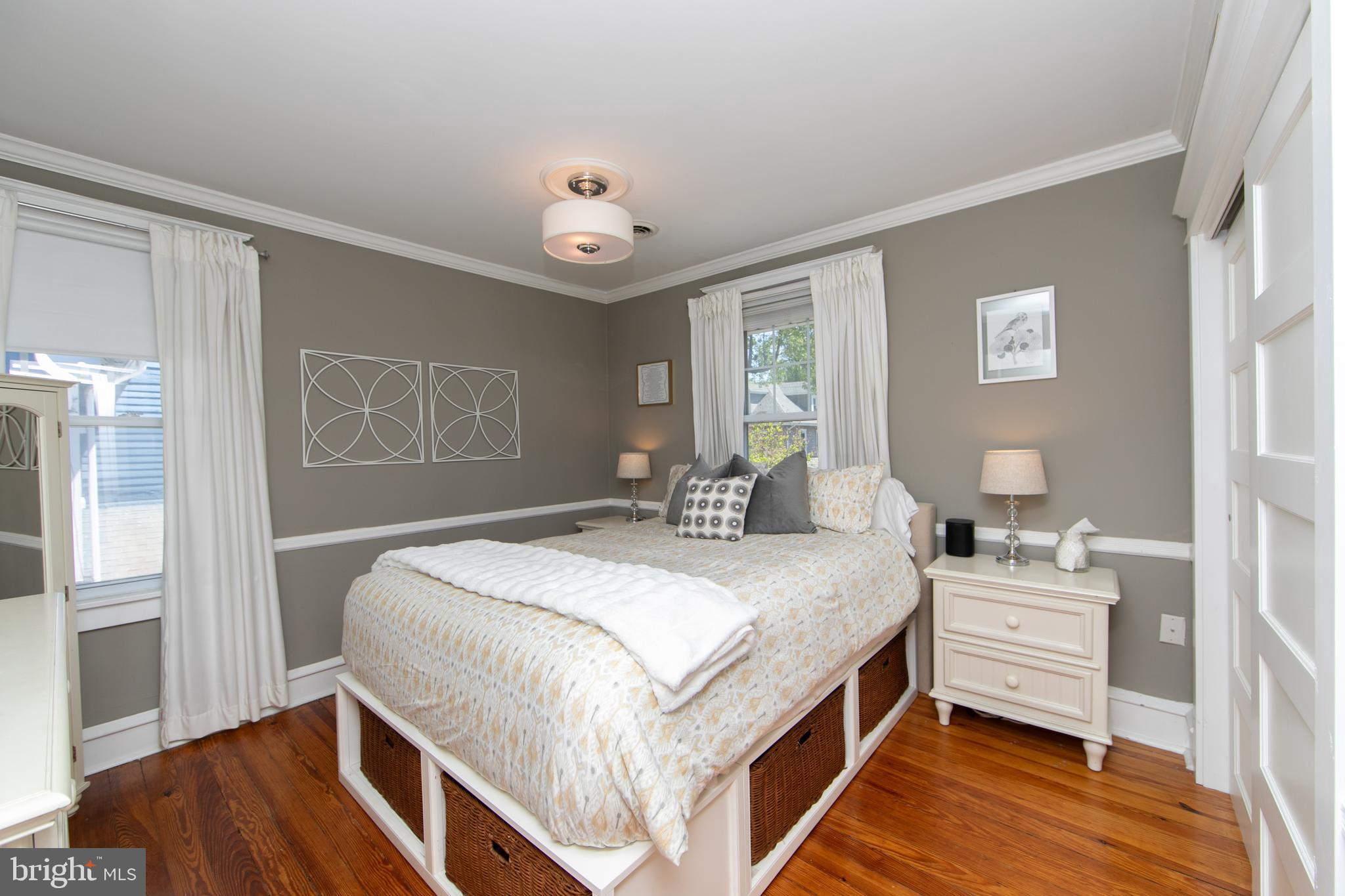 403 Belmont Avenue Haddonfield, NJ 08033 - Photo 27 of 47 a bedroom with a bed and wooden floor
