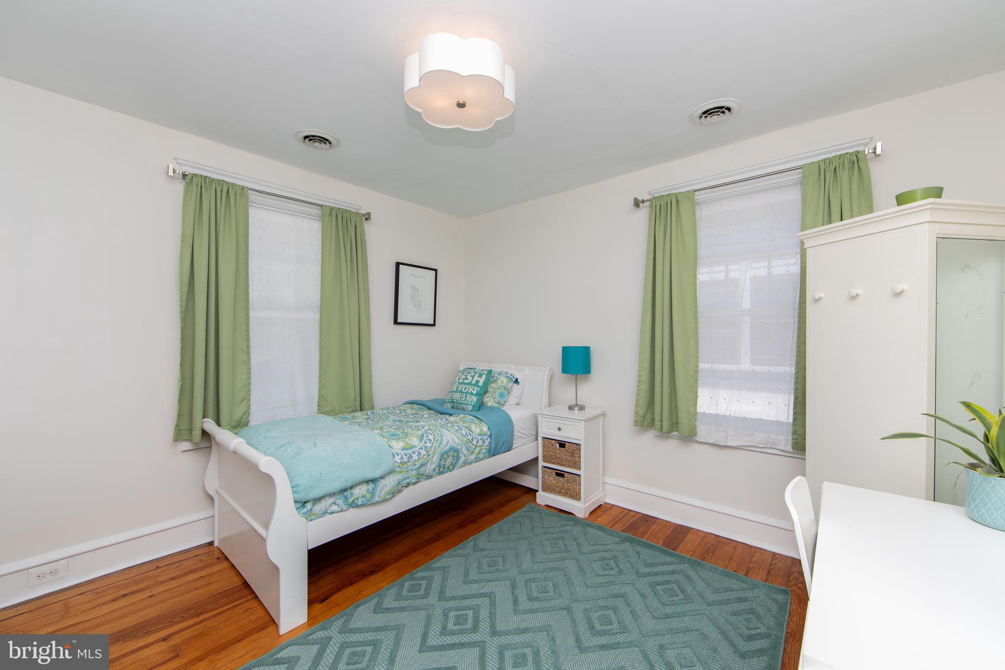 403 Belmont Avenue Haddonfield, NJ 08033 - Photo 29 of 47 a bedroom with a bed and a window