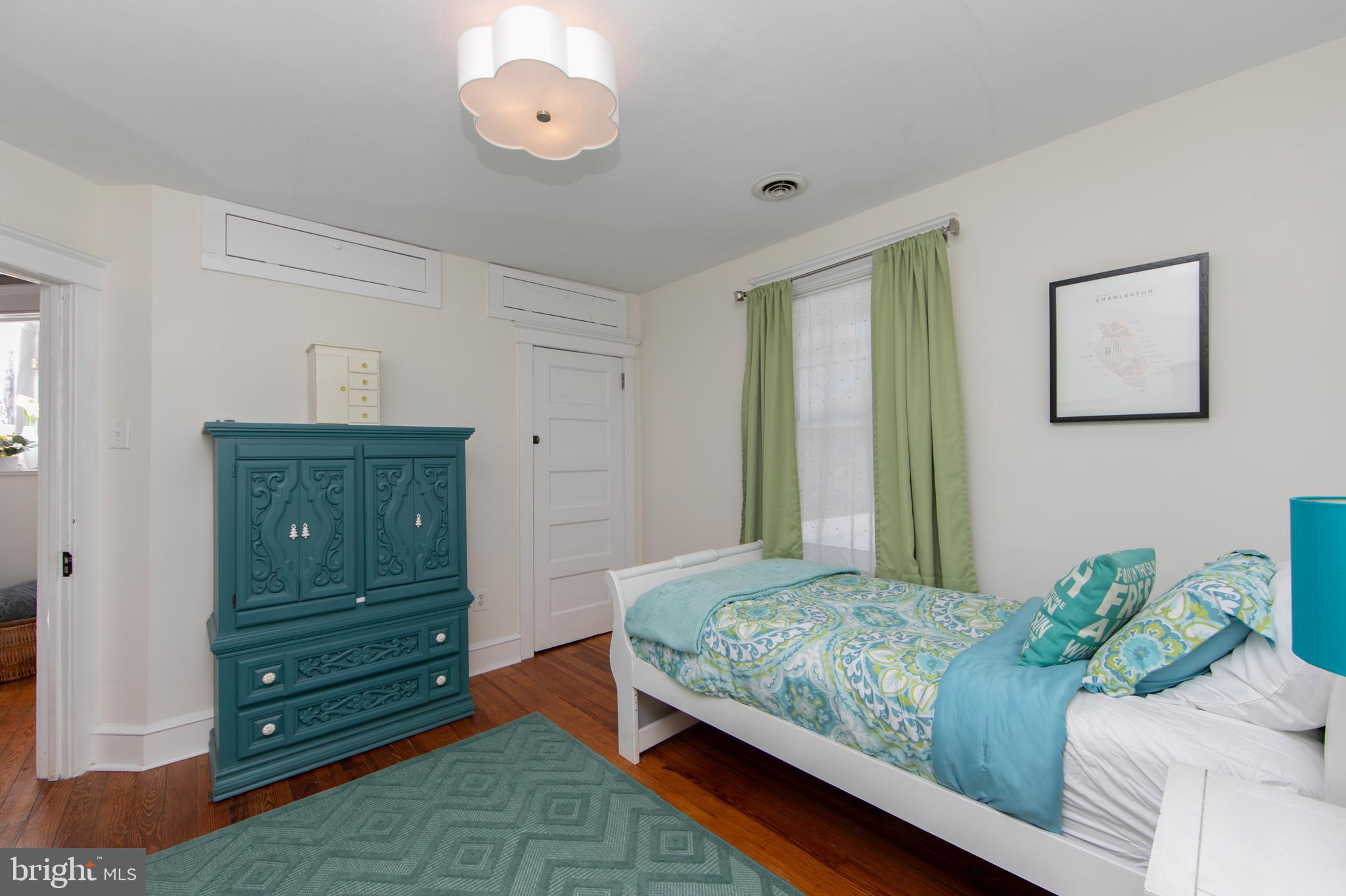 403 Belmont Avenue Haddonfield, NJ 08033 - Photo 31 of 47 a bedroom with a bed and a dresser