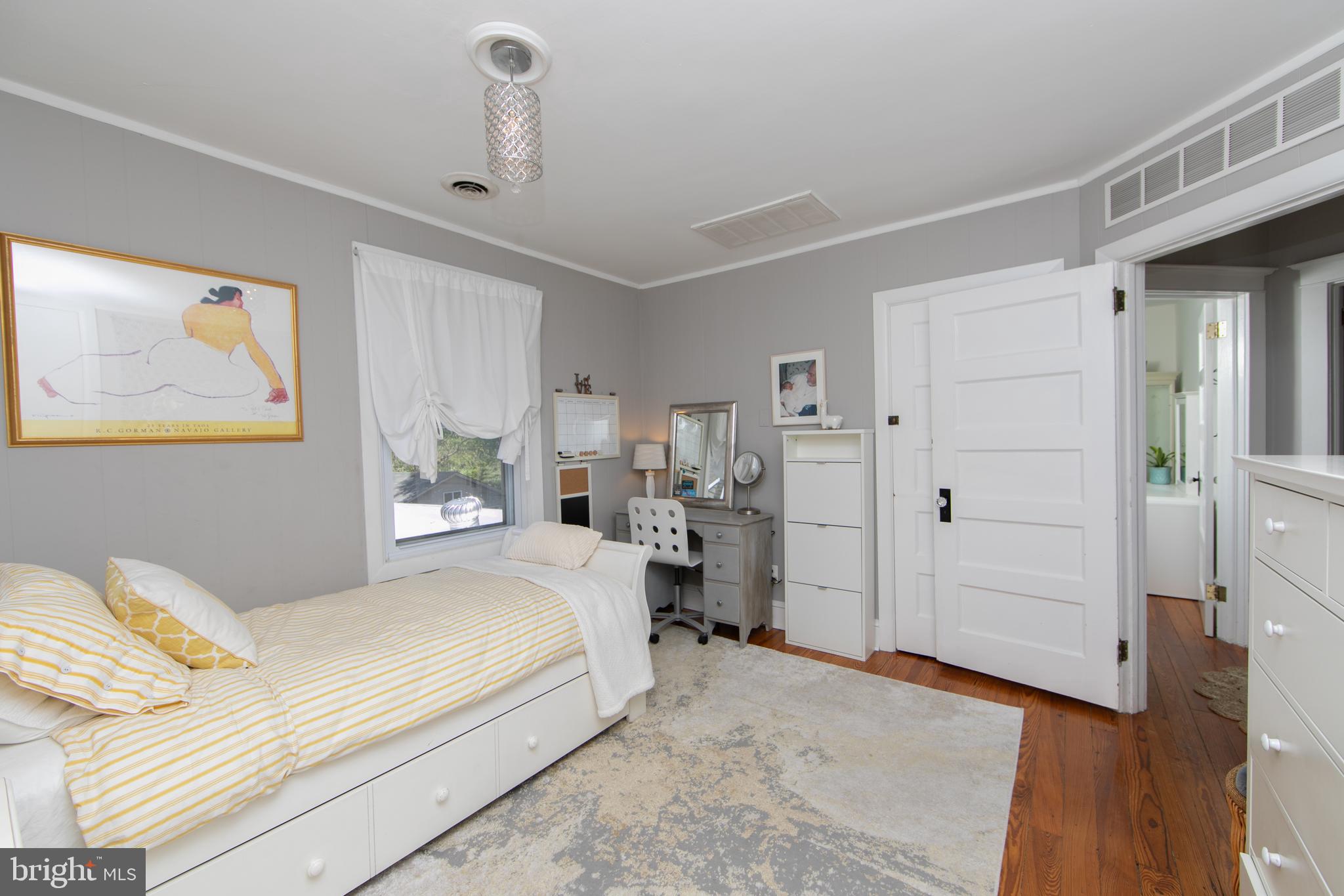 403 Belmont Avenue Haddonfield, NJ 08033 - Photo 33 of 47 a bedroom with a bed and a painting on the wall