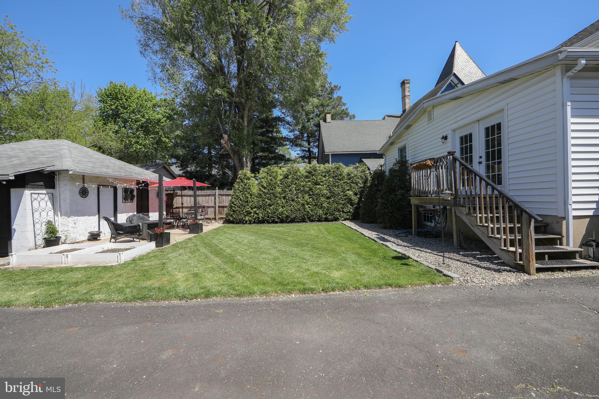 403 Belmont Avenue Haddonfield, NJ 08033 - Photo 41 of 47 a front view of a house with garden