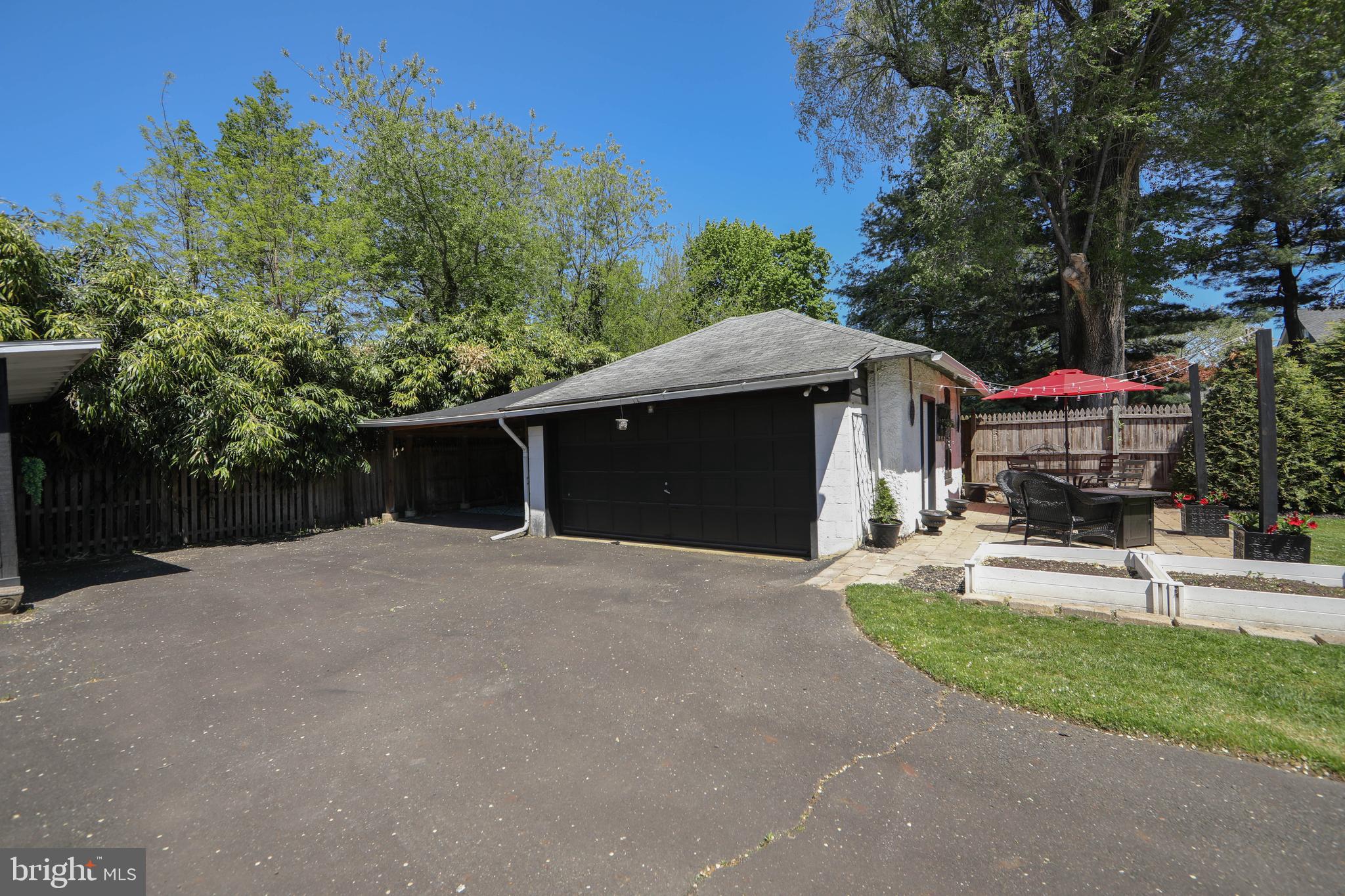 403 Belmont Avenue Haddonfield, NJ 08033 - Photo 42 of 47 a front view of a house with a yard and garage