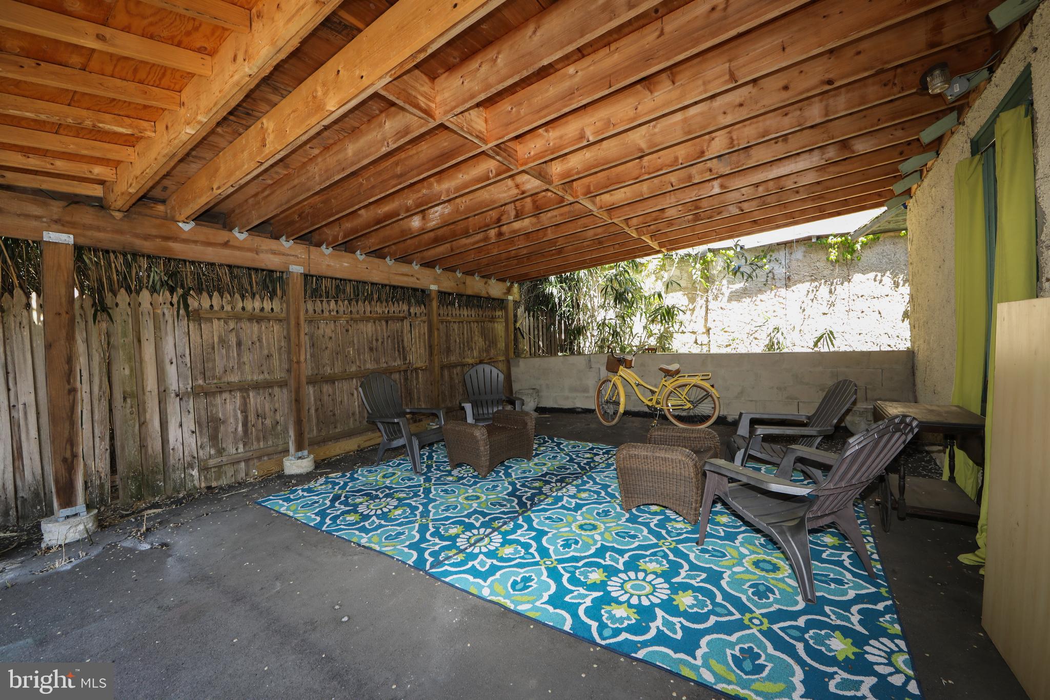 403 Belmont Avenue Haddonfield, NJ 08033 - Photo 43 of 47 a view of a patio with table and chairs and potted plants