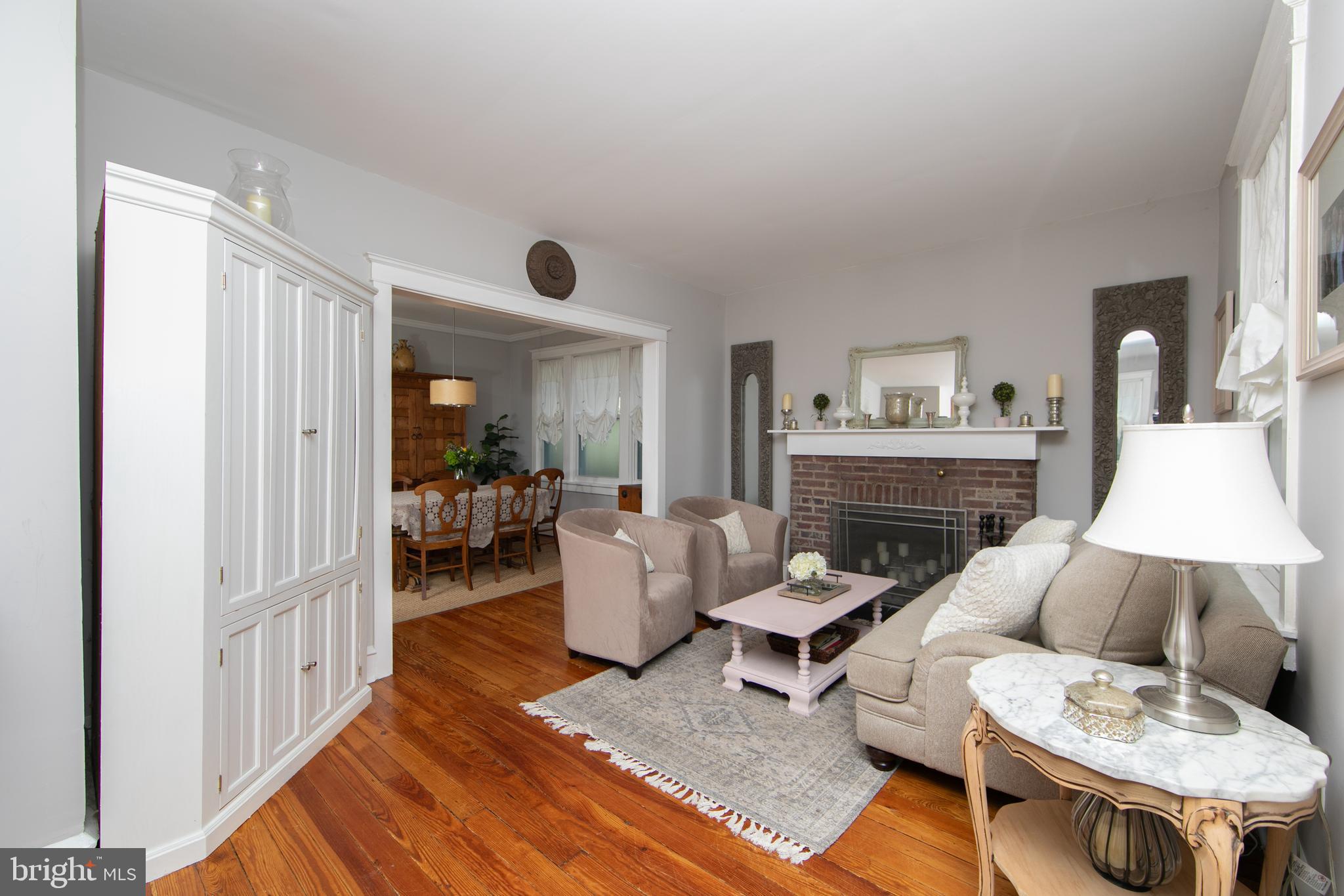 403 Belmont Avenue Haddonfield, NJ 08033 - Photo 7 of 47 a living room with furniture and a fireplace