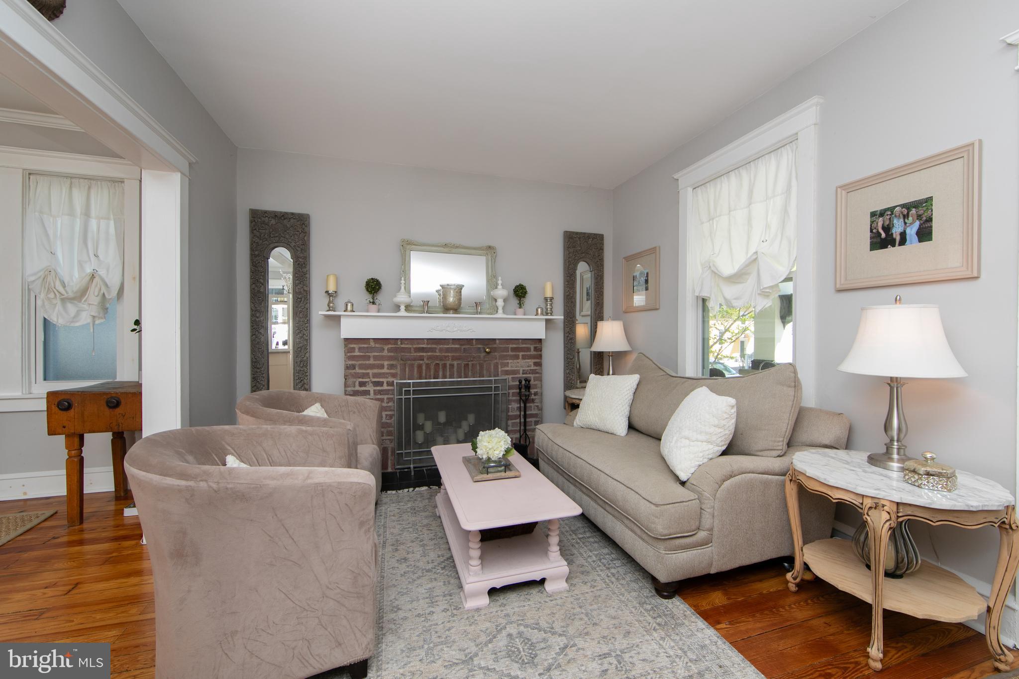 403 Belmont Avenue Haddonfield, NJ 08033 - Photo 8 of 47 a living room with furniture and a fireplace