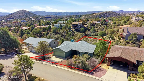 a aerial view of a house with a garden