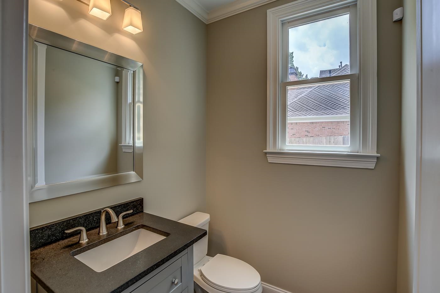 1908 Riverdale Road Germantown, TN 38138 - Photo 11 of 40 QUARTZ vanity. Hardwood floor. 2 piece crown molding. Located at hallway to Bedroom 2.